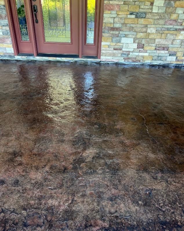 shiny-decorative-concrete-knoxville-tn Shiny decorative colored concrete patio with high gloss sealer by Crescostone concrete contractor Knoxville TN